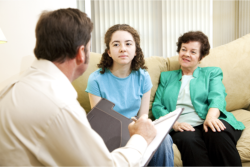 teen having a consultation together with her grandmother